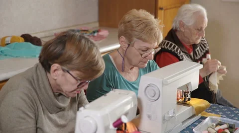 Women work to their handmade products at home, sewing 스톡 동영상 59641630