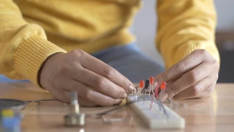 Women Working with Electrical Systems for Computers and Microchips Stock Footage 121771986