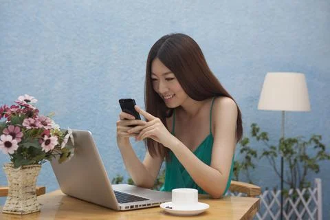 A women working in front of computers Stock Photos