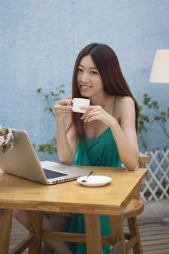 A women working in front of computers Stock Photos