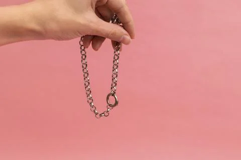 Women's bijouterie on pink background, object shot Stock Photos