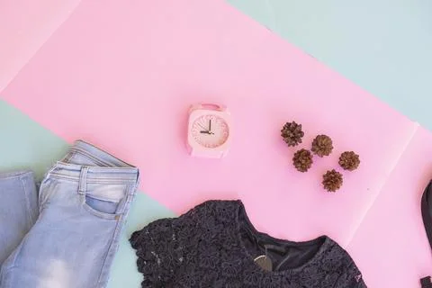 Women's clothing basic layout, Black Blouse on pale mint pastel background. L Stock Photos