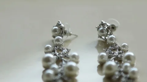 Women's earrings Stock Footage 107381191