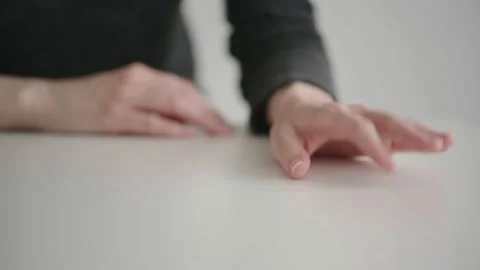 Women's fingers tapping nervously on the table. Nervousness, excitement Stock Footage 153917793
