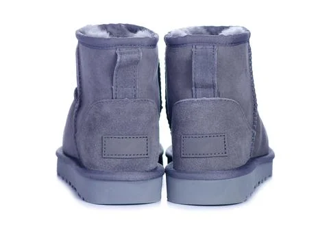 Women's gray winter boots Stock Photos