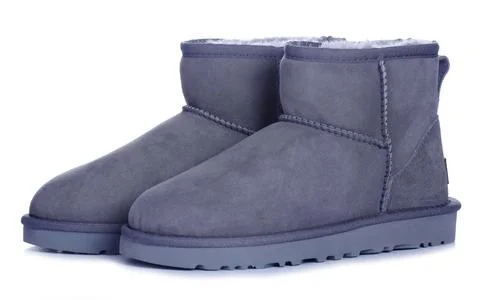 Women's gray winter boots Stock Photos
