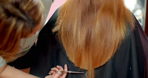 Women's hair cut into a U shape for the beauty of women. Stock Footage 239832550