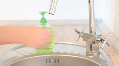 Women's hands are cleaned an apple Stock Footage 1087429