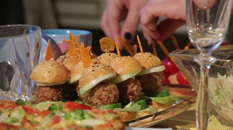 Women's hands are doing canapes. Stock Footage 32188271
