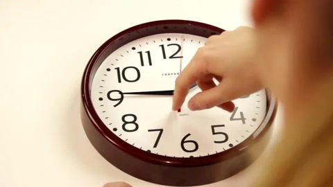 Women's hands are moving clocks Stock Footage 160361193