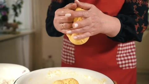 Women's hands are preparing dough for pashka in the kitchen, close-up Stock Footage 253916498