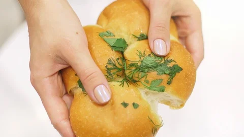 Women's hands breaking bread Stockbeeldmateriaal 97823595