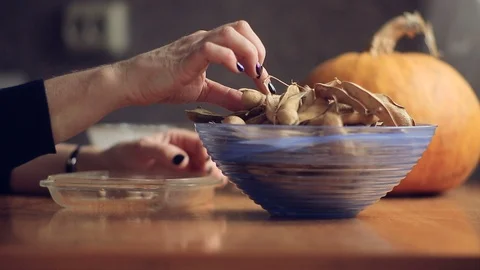 Women's hands clean dried beans Stock Footage 97832103