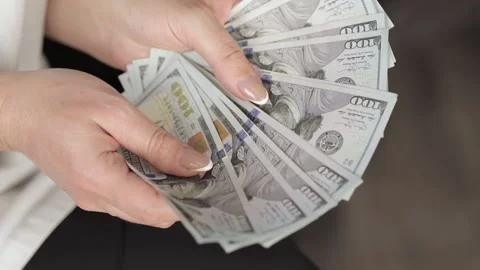 Women's hands count dollar banknotes Stock-Footage 232633523