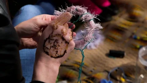 Women's Hands Create a Decorative Dream Catcher with Needle and Thread Stock Footage 259432306