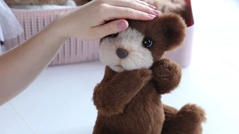 Women's hands create a textile product, toy, pattern Video stock 88231506