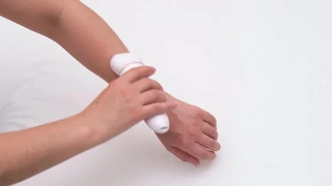 Womens hands doing depilation on their hands Stock Footage 310044903