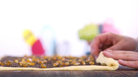 Women's hands form a roll of dough Stock Footage 88695102