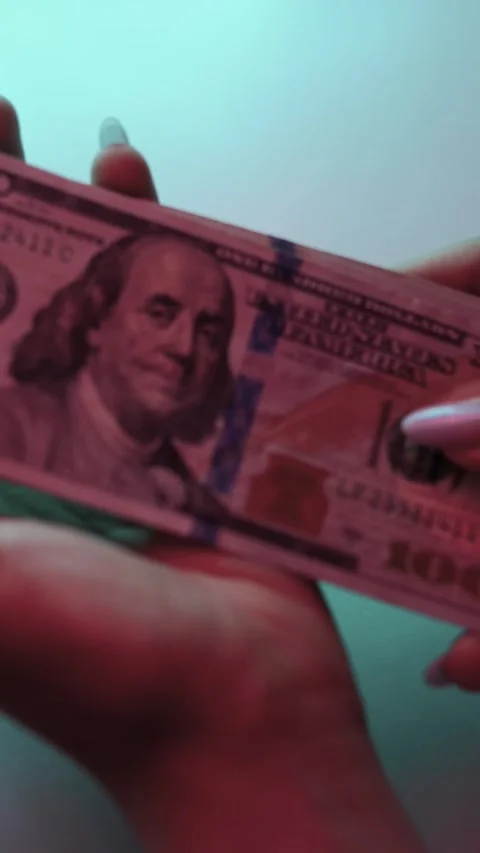 Women's hands hold, count, leaf through dollars in their hands, close-up Stock Footage 250124734