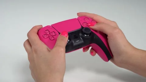 Women's Hands Holding Dualsense Controller. Video stock 233884989