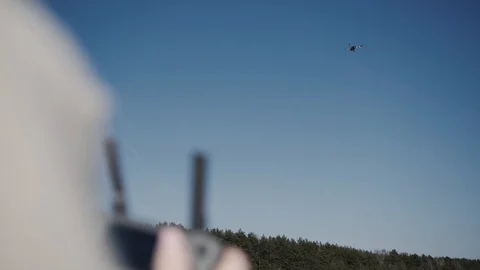 Women's hands holding a remote control drone. Stock Footage 106718162