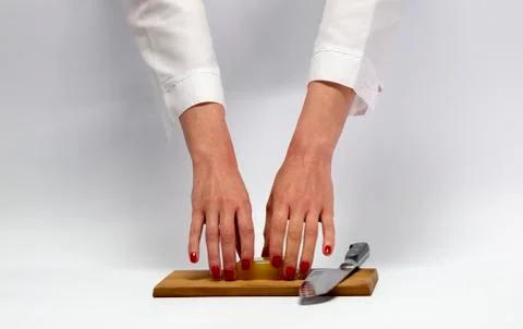 Women's hands in the kitchen. Stock Photos