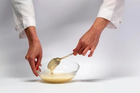 Women's hands in the kitchen. Stock Photos