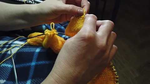 Women's hands knit woolen jacket with knitting needles. Video stock 152733041