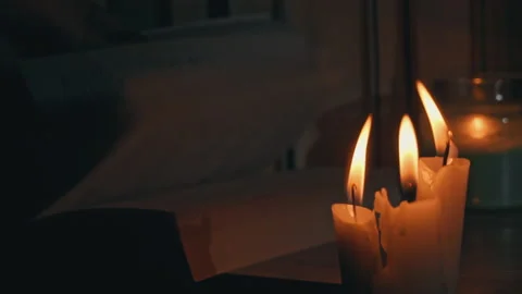 Women's Hands Leaf Through an Old Book By Candlelight Stock Footage 237968975