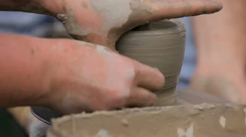 Women's hands making ceramic cup on potter's wheel Video stock 52348275