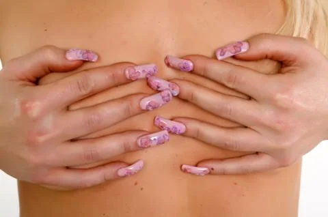 Women's hands with a nice manicure Stock Photos