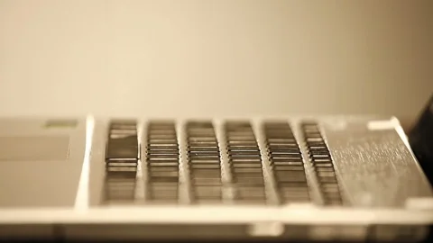 Women's hands with nice nails are typing on the keyboard of the lap top Video stock 89343555