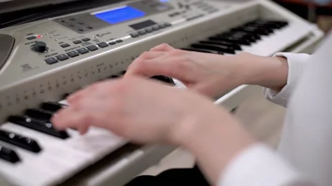 Women's hands playing synthesizer, composing music Stock Footage 150022244
