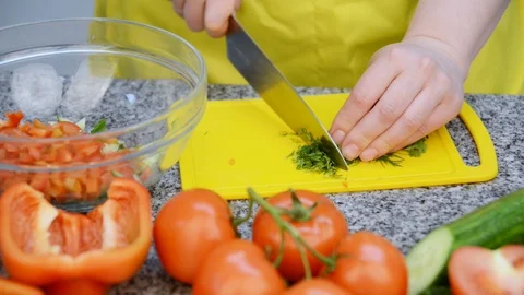 Women's hands prepare a vegetable salad Stock Footage 92968163
