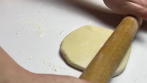 Women's hands in the process of cooking kutba or chebureki, minced meat and Stock Footage 239062937