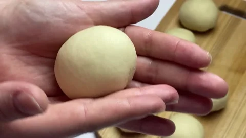Women's hands in the process of cooking kutba or chebureki, minced meat and Stock Footage 239062955