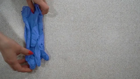 Women's hands put on the table antiseptic Vidéo 127864521