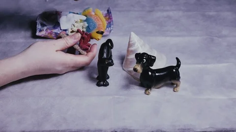 Women's hands rubbed little pieces of dust Stock Footage 103166341