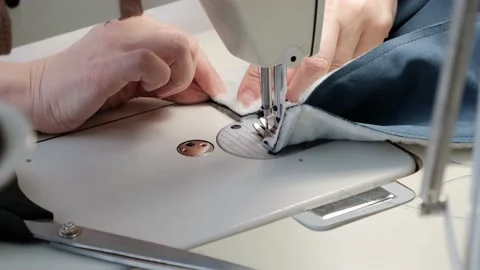 Women's hands sew on a sewing machine Stock Footage 152018145