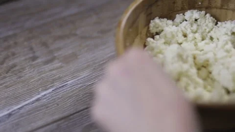 Women's hands stirred curd Stock Footage 72994002