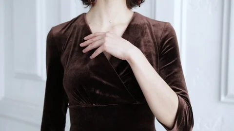 Women's hands touch the chic black dress, slow motion Stock-Footage 102379553