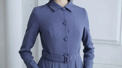 Women's hands touch chic blue dress, slow motion Stock Footage 102379456