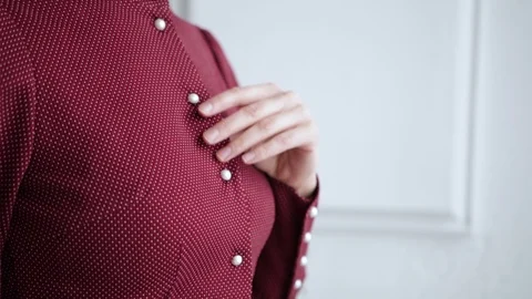 Women's hands touch the chic red dress, slow motion Stock Footage 102379575