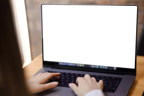 Women's hands type on the keyboard close-up with space for copy. Stock Photos