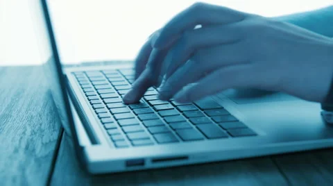 Women's hands typing on computer keyboard Stock Footage 51650899