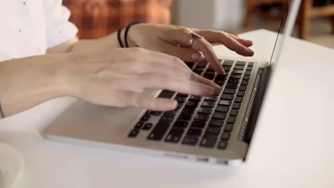 Women's hands typing on computer keyboard Stock Footage 83210919