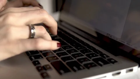 Women's hands typing on computer RUSSIAN keyboard Stock Footage 83963670