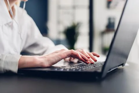 Women's hands typing on keyboard Stock Photos