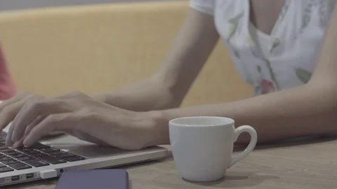 Women's hands typing on laptop computer Stock Footage 88594077
