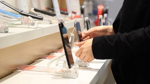 Women's hands use a mobile device Stock Footage 103796461